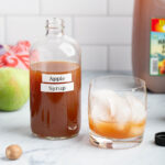 Apple Syrup | Turn fresh apple cider into a sweet syrup w/ a little tartness & warm spices. Perfect in drinks, like coffee, tea & cocktails! #syrup #applecider #condiment #fallrecipe #cocktail #mocktail #drink #cinnamon #nutmeg #holidayrecipe #partyrecipe #easyrecipe #applepicking | The Missing Lokness